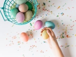 a basket of painted eggs for Easter