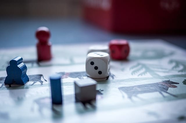 view of dice and markers on a board game