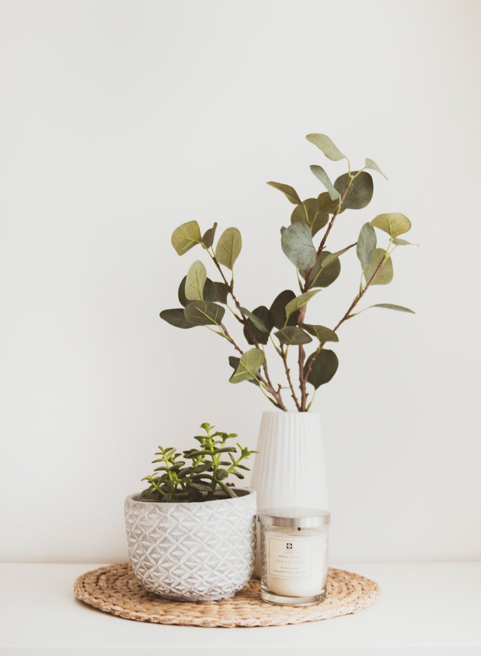 two white flower vases