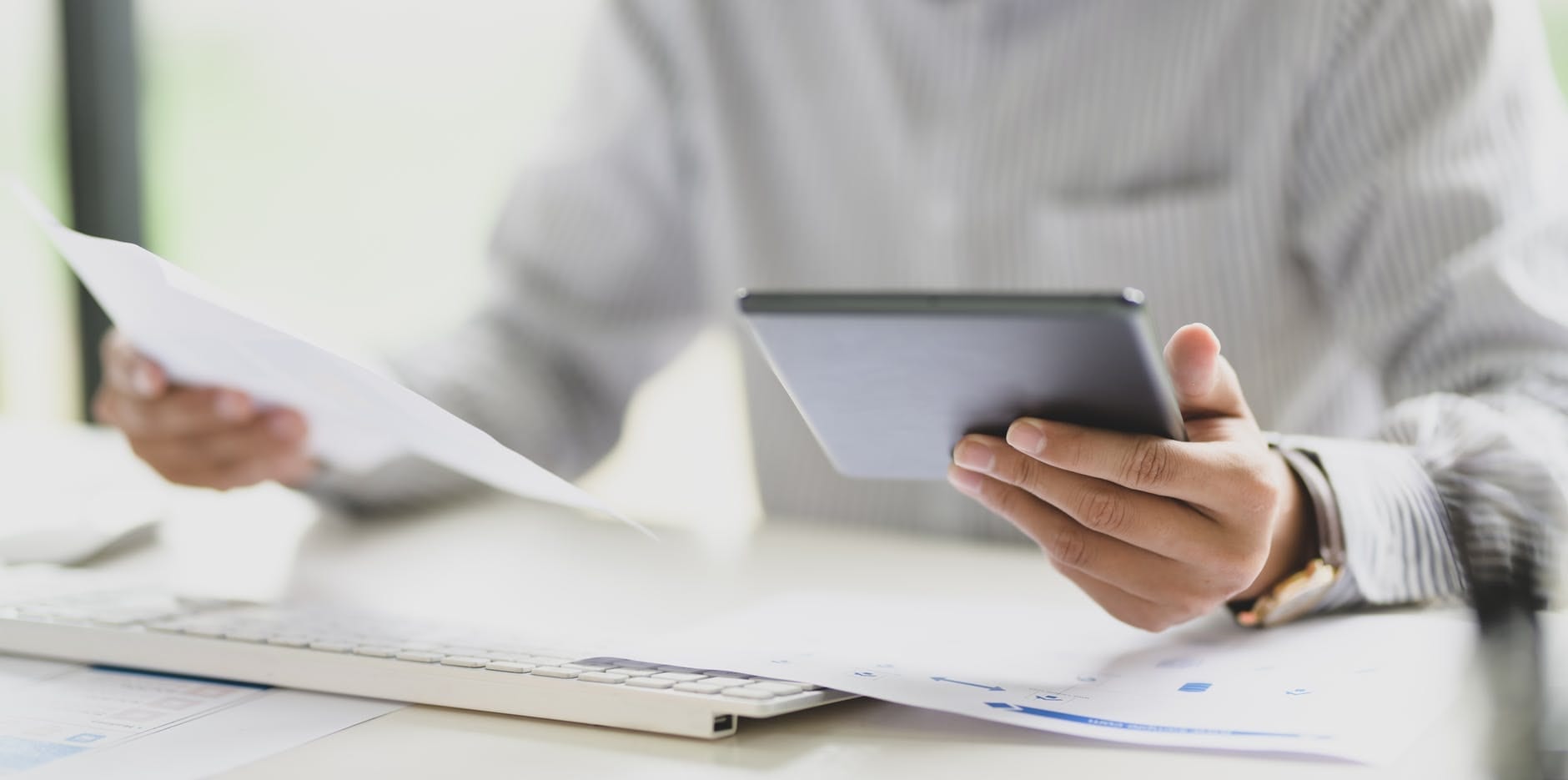 person holding tablet computer